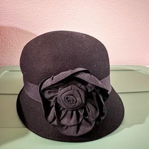 Black felt hat with flower bow